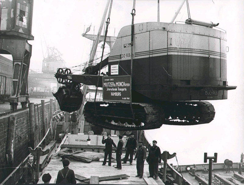 1930-Baggerverladung Solutions de transport de marchandise international